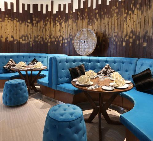 Imagen del bar/restaurante del Hotel Primebiz Cikarang. Foto 10