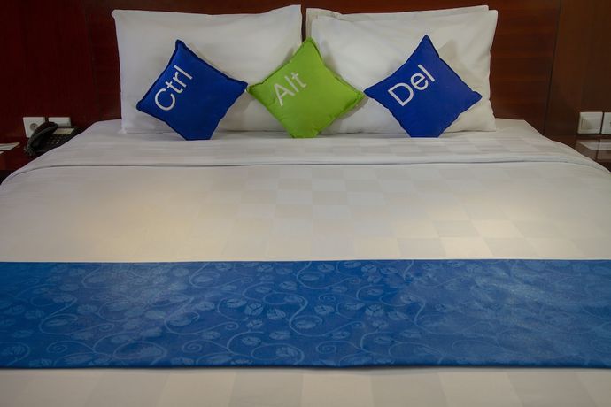 Imagen de la habitación del Hotel Primebiz Kuta. Foto 14
