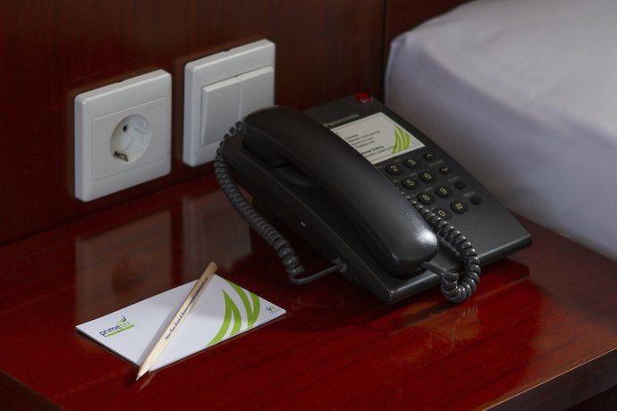 Imagen de la habitación del Hotel Primebiz Kuta. Foto 17