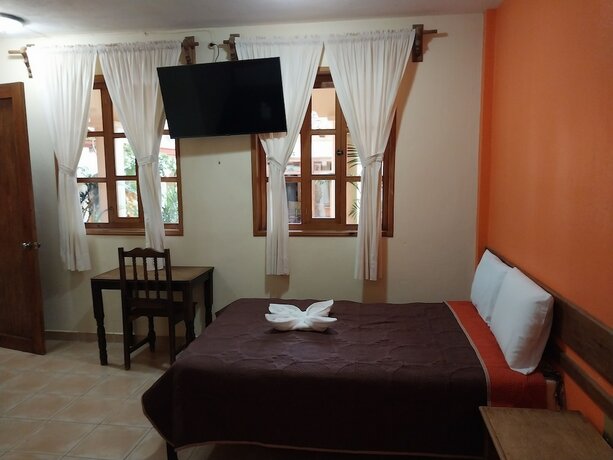 Imagen de la habitación del Hotel Primera Calle Norte Poniente. Foto 16