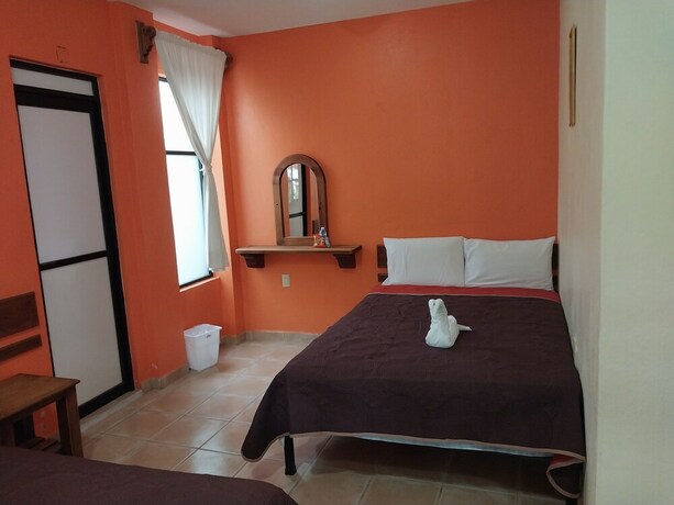 Imagen de la habitación del Hotel Primera Calle Norte Poniente. Foto 17