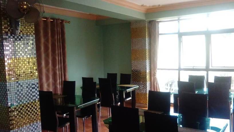 Imagen del bar/restaurante del Hotel Primera, Kampala. Foto 3