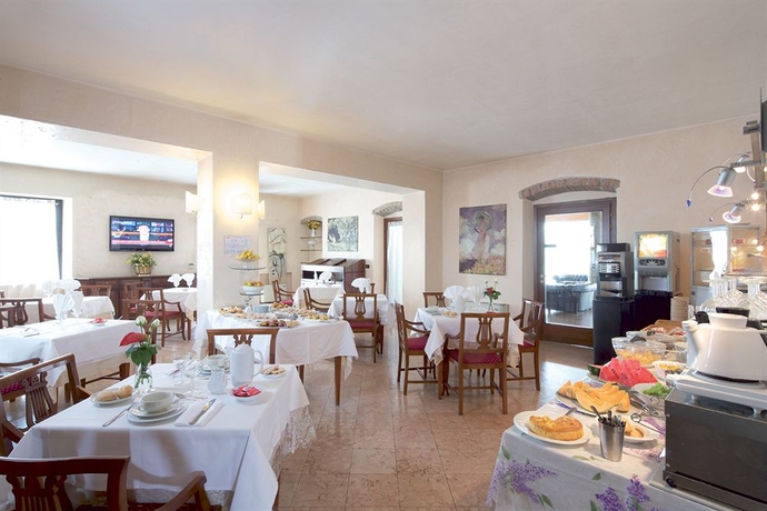 Imagen del bar/restaurante del Hotel Primotel Brescia. Foto 2