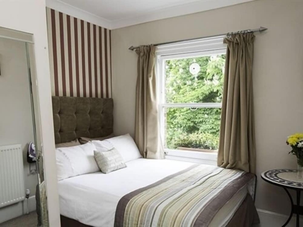 Imagen de la habitación del Hotel Primrose Guest House. Foto 2