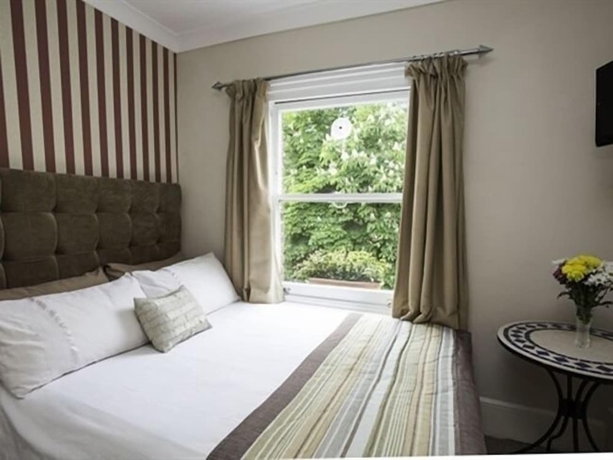 Imagen de la habitación del Hotel Primrose Guest House. Foto 5