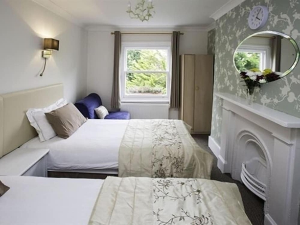 Imagen de la habitación del Hotel Primrose Guest House. Foto 8