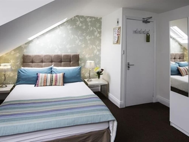 Imagen de la habitación del Hotel Primrose Guest House. Foto 10