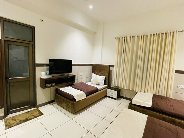 Imagen de la habitación del Hotel Primrose Regency. Foto 14