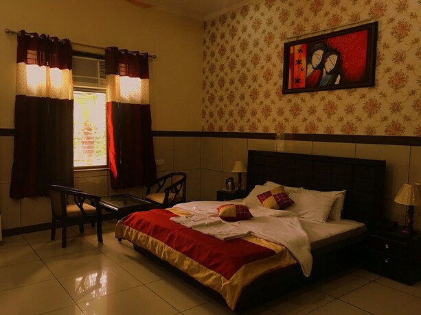 Imagen de la habitación del Hotel Primrose Regency. Foto 17