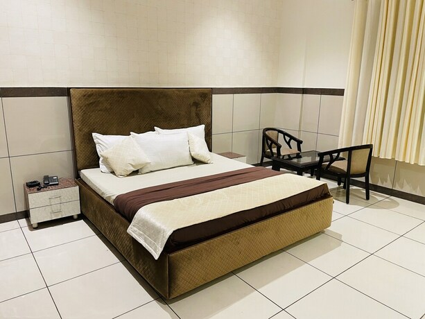 Imagen de la habitación del Hotel Primrose Regency. Foto 18