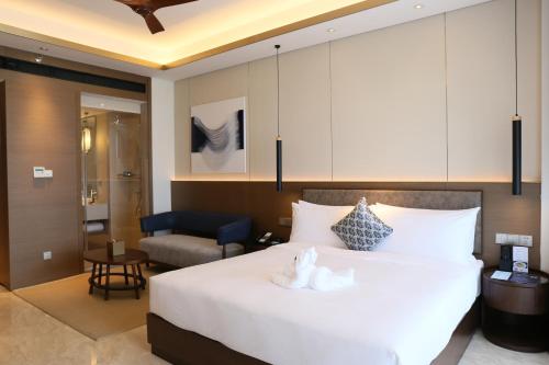 Imagen de la habitación del Hotel Primus Sanya Pleasant Bay. Foto 6
