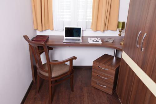 Imagen de la habitación del Hotel Primus & Apartments. Foto 13