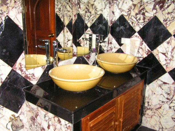 Imagen de la habitación del Hotel Prince Edouard Apartment and Resort. Foto 11