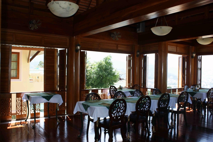 Imagen del bar/restaurante del Hotel Prince Edouard Apartment and Resort. Foto 3