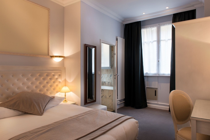 Imagen de la habitación del Hotel Princesse Caroline. Foto 13