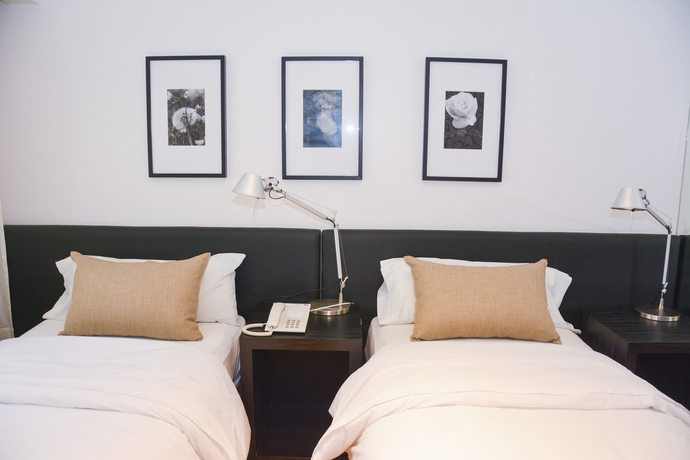 Imagen de la habitación del Hotel Principado Downtown. Foto 3