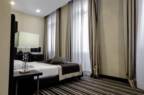 Imagen de la habitación del Hotel Principe Di Torino. Foto 16