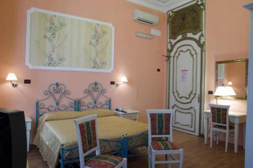 Imagen de la habitación del Hotel Principi D'acaja. Foto 10