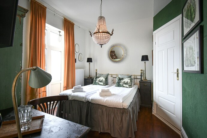 Imagen de la habitación del Hotel Prins Carl. Foto 28