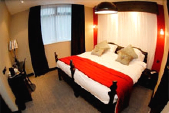 Imagen de la habitación del Hotel Printworks. Foto 18