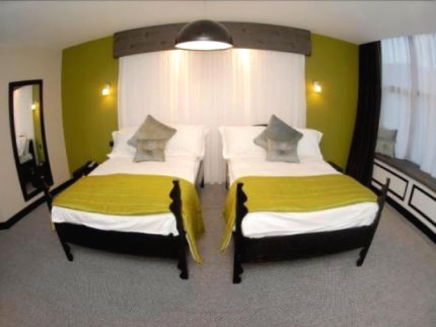 Imagen de la habitación del Hotel Printworks. Foto 19