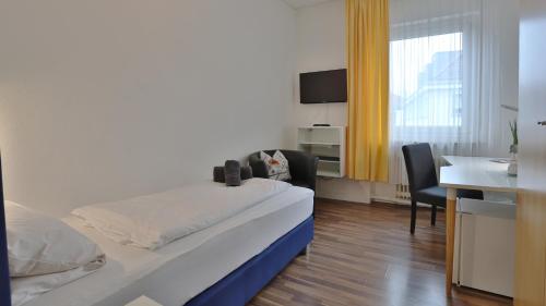 Imagen de la habitación del Hotel Prinz Carl. Foto 17
