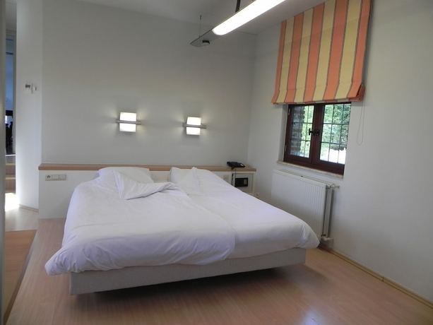 Imagen de la habitación del Hotel Priorij Corsendonk. Foto 11