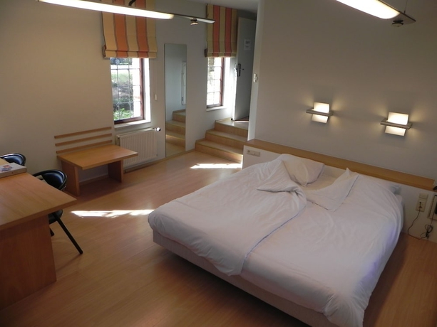Imagen de la habitación del Hotel Priorij Corsendonk. Foto 15