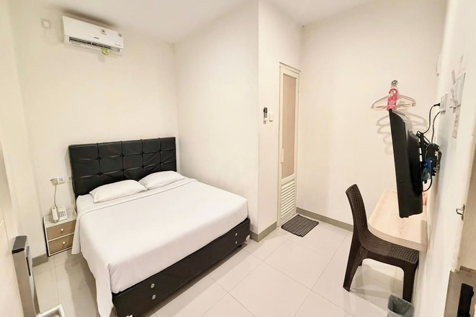 Imagen de la habitación del Hotel Priority Kalimantan Samarinda. Foto 3