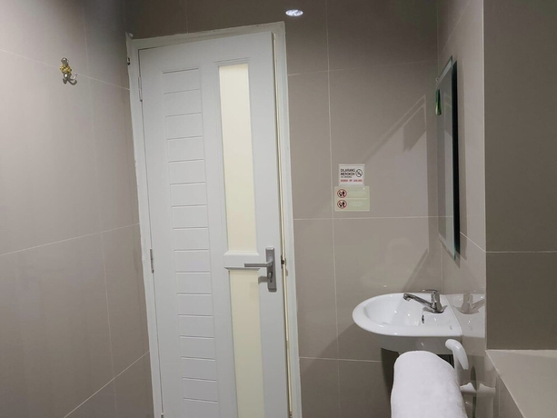 Imagen de la habitación del Hotel Priority Teuku Umar Samarinda. Foto 7