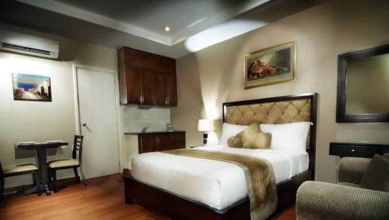 Imagen de la habitación del Hotel Prism Apartelle Hotel. Foto 9