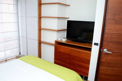 Imagen de la habitación del Hotel Prisma Suites Chic&oacute; 94. Foto 6
