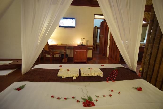 Imagen de la habitación del Hotel Pristine Lotus Resort. Foto 11