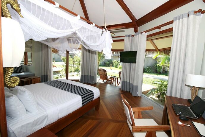 Imagen de la habitación del Hotel Pristine Mermaid Resort. Foto 18