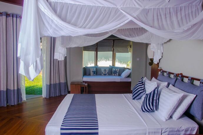 Imagen de la habitación del Hotel Pristine Mermaid Resort. Foto 20