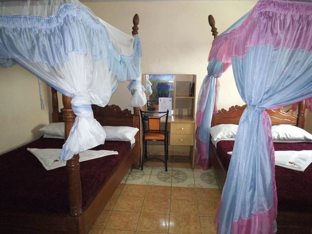 Imagen de la habitación del Hotel Pristine Paradise. Foto 6