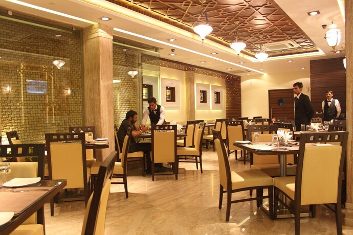 Imagen del bar/restaurante del Hotel Pristine Residency. Foto 12