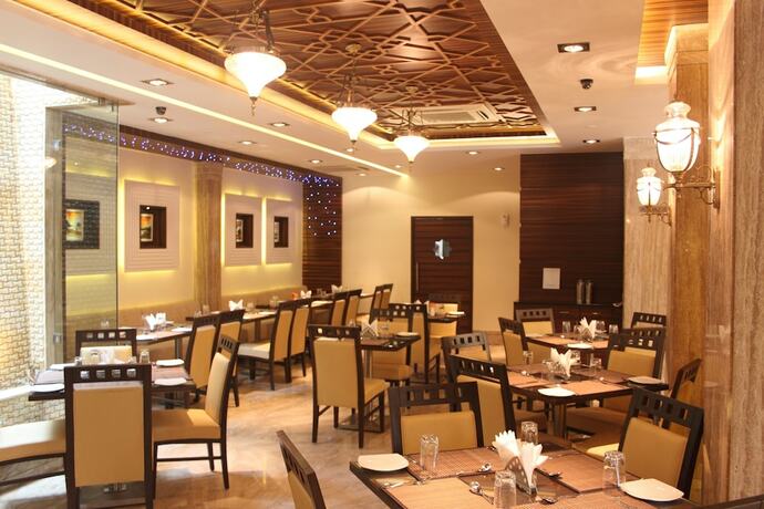 Imagen del bar/restaurante del Hotel Pristine Residency. Foto 14