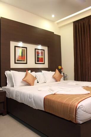 Imagen de la habitación del Hotel Pristine Residency. Foto 19