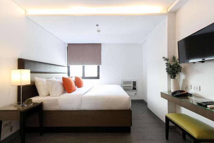 Imagen de la habitación del Hotel Privato Makati. Foto 12