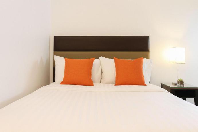 Imagen de la habitación del Hotel Privato Makati. Foto 13