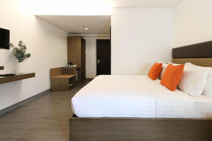 Imagen de la habitación del Hotel Privato Makati. Foto 15