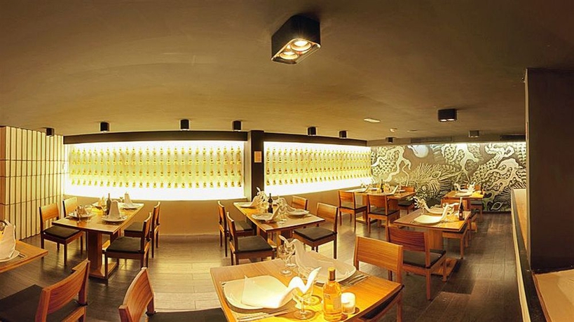 Imagen del bar/restaurante del Hotel Privilege Aluxes Isla Mujeres Adults Only. Foto 3