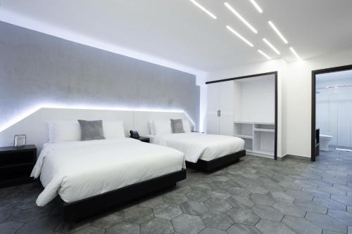 Imagen de la habitación del Hotel Prixma. Foto 15