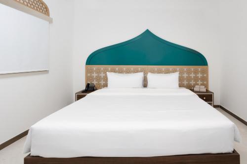 Imagen de la habitación del Hotel Prixma. Foto 16