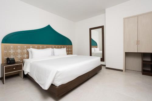 Imagen de la habitación del Hotel Prixma. Foto 17