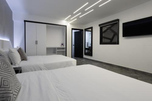 Imagen de la habitación del Hotel Prixma. Foto 18