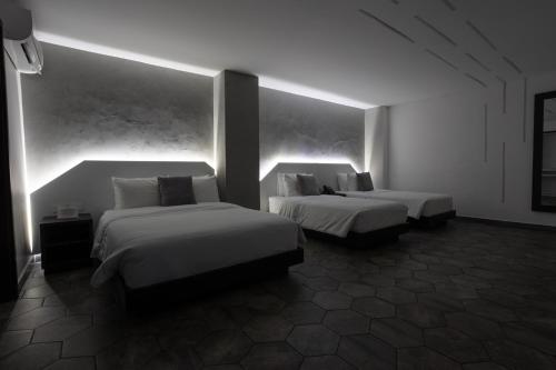 Imagen de la habitación del Hotel Prixma. Foto 20