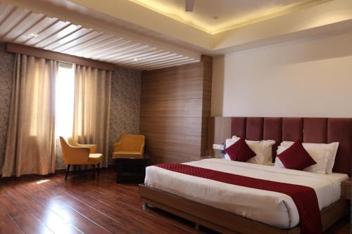 Imagen de la habitación del Hotel Priyadarshan. Foto 13