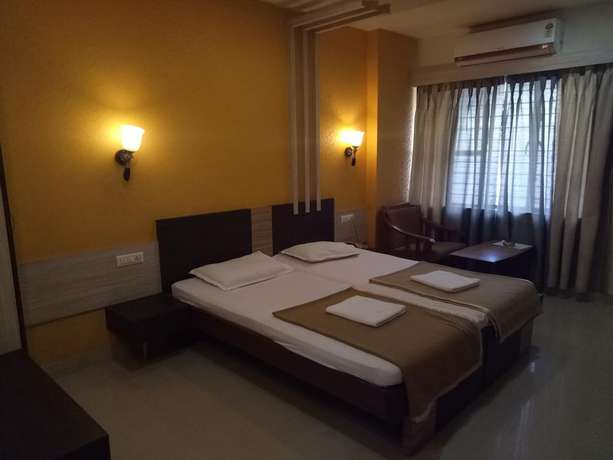 Imagen de la habitación del Hotel Priyadarshini Classic. Foto 10